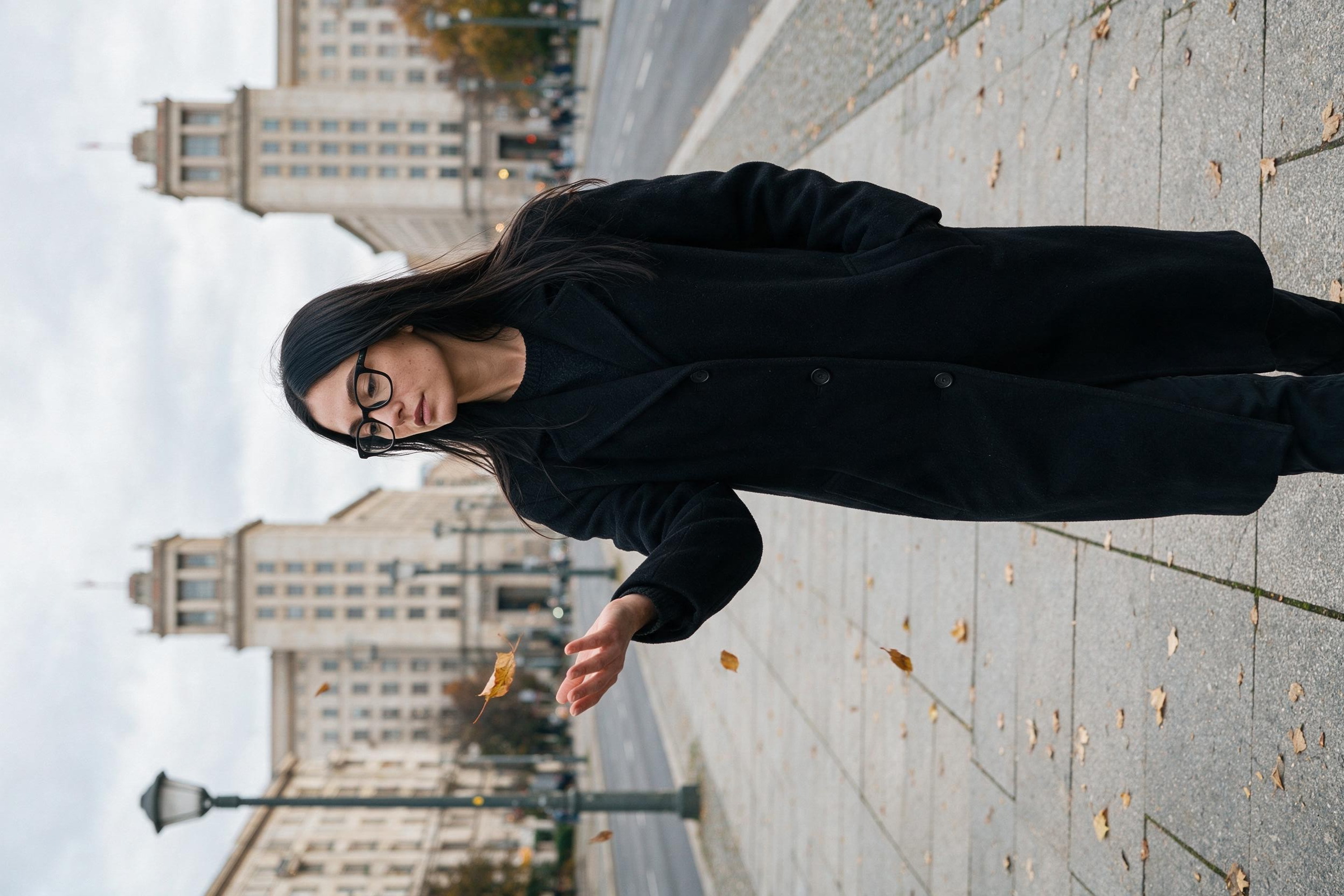 Me walking Karl-Marx-Allee, catching a falling leaf.
