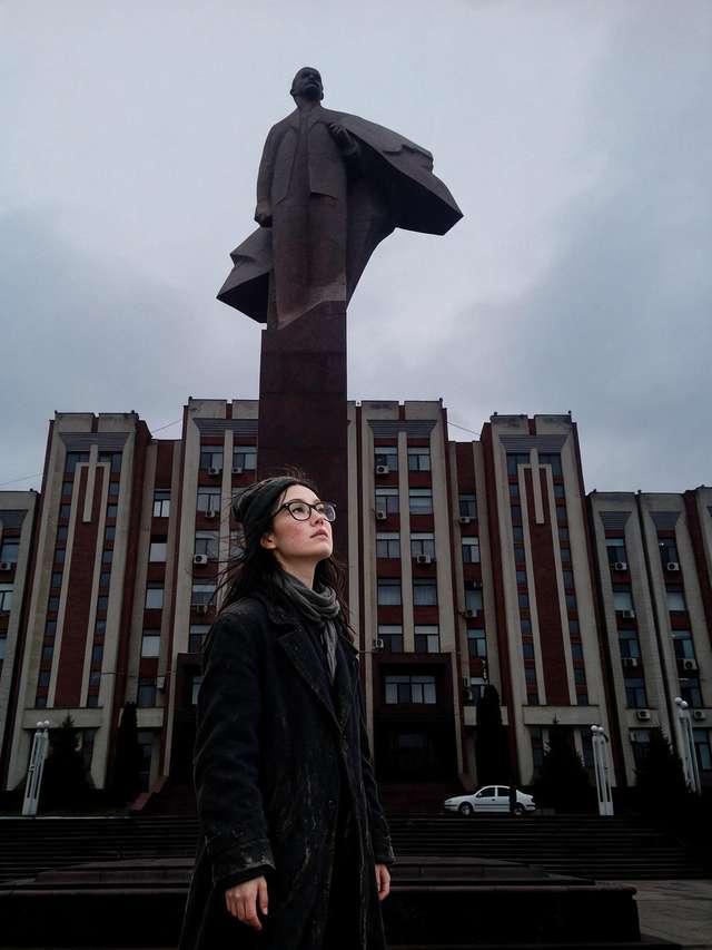 Me on the wide steps below the granite Lenin in Tiraspol.